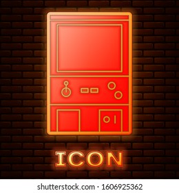 Glowing neon Retro arcade game machine icon isolated on brick wall background.  Vector Illustration