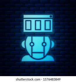 Glowing neon Robot icon isolated on brick wall background.  Vector Illustration