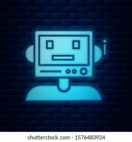 Glowing neon Robot icon isolated on brick wall background.  Vector Illustration