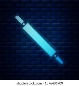 Glowing neon Rolling pin icon isolated on brick wall background.  Vector Illustration