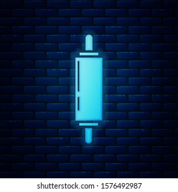 Glowing neon Rolling pin icon isolated on brick wall background.  Vector Illustration