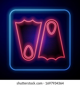 Glowing neon Rubber flippers for swimming icon isolated on blue background. Diving equipment. Extreme sport. Sport equipment.  Vector Illustration