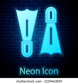 Glowing neon Rubber flippers for swimming icon isolated on brick wall background. Diving equipment. Extreme sport. Diving underwater equipment.  Vector