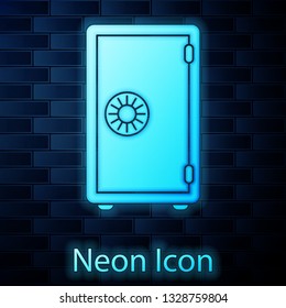 Glowing neon Safe icon isolated on brick wall background. The door safe a bank vault with a combination lock. Reliable Data Protection. Vector Illustration