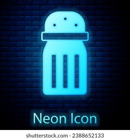 Glowing neon Salt icon isolated on brick wall background. Cooking spices.  Vector