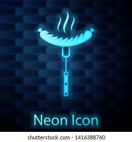 Glowing neon Sausage on the fork with steam icon isolated on brick wall background. Grilled sausage and aroma sign. Vector Illustration