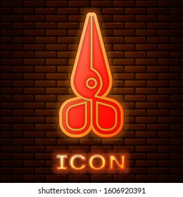 Glowing neon Scissors icon isolated on brick wall background. Cutting tool sign.  Vector Illustration