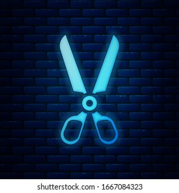 Glowing neon Scissors icon isolated on brick wall background. Cutting tool sign.  Vector Illustration