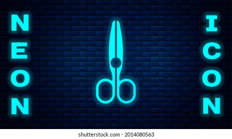 Glowing neon Scissors icon isolated on brick wall background. Tailor symbol. Cutting tool sign.  Vector