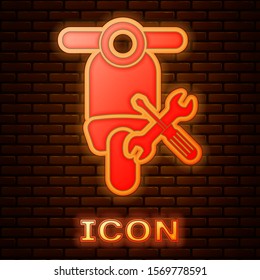 Glowing neon Scooter with screwdriver and wrench icon isolated on brick wall background. Adjusting, service, setting, maintenance, repair, fixing.  Vector Illustration