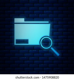 Glowing neon Search concept with folder icon isolated on brick wall background. Magnifying glass and document. Data and information sign.  Vector Illustration