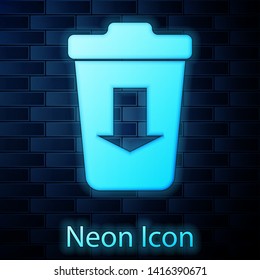 Glowing neon Send to the trash icon isolated on brick wall background. Vector Illustration