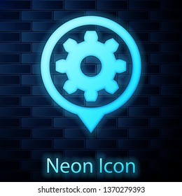 Glowing neon Setting icon isolated on brick wall background. Tools, service, cog, gear, cogwheel sign. Vector Illustration