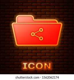 Glowing neon Share folder icon isolated on brick wall background. Folder sharing. Folder transfer sign.  Vector Illustration