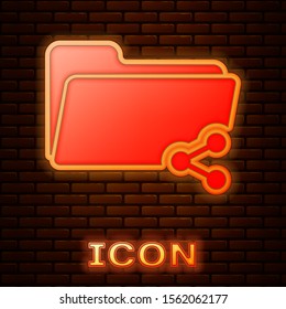 Glowing neon Share folder icon isolated on brick wall background. Folder sharing. Folder transfer sign.  Vector Illustration