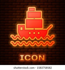 Glowing neon Ship icon isolated on brick wall background.  Vector Illustration