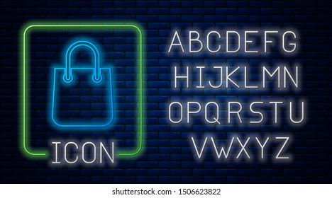 Glowing neon Shopping bag icon isolated on brick wall background. Package sign. Neon light alphabet. Vector Illustration
