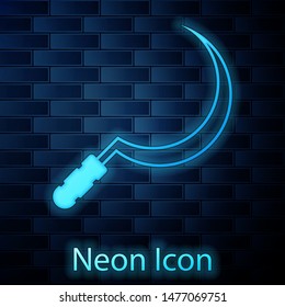 Glowing neon Sickle icon isolated on brick wall background. Reaping hook sign.  Vector Illustration