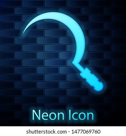 Glowing neon Sickle icon isolated on brick wall background. Reaping hook sign.  Vector Illustration