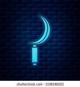 Glowing neon Sickle icon isolated on brick wall background. Reaping hook sign.  Vector Illustration