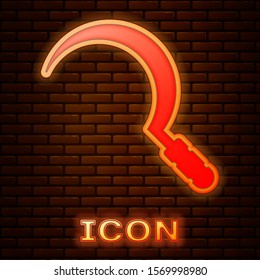 Glowing neon Sickle icon isolated on brick wall background. Reaping hook sign.  Vector Illustration