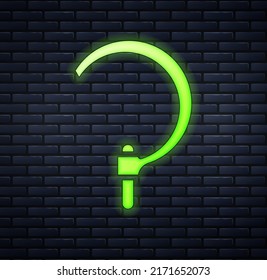 Glowing neon Sickle icon isolated on brick wall background. Reaping hook sign.  Vector