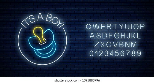 Glowing Neon Sign With Congratulations On The Birth Of A Baby Boy With Alphabet On Dark Brick Wall Background. Ribbon Pacifier Symbol With Its A Boy Text In Neon Style. Vector Illustration.