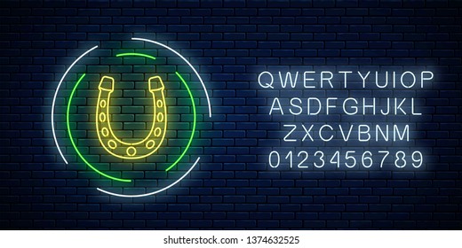 Glowing neon sign with horseshoe in circle frame with alphabet on dark brick wall background. Horse shoe emblem in neon style for luck. Vector illustration.