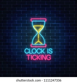 Glowing neon sign with hourglass and clock is ticking text on dark brick wall background. Call to action symbol of sandglass with cheering inscription. Its time to work. Vector illustration.