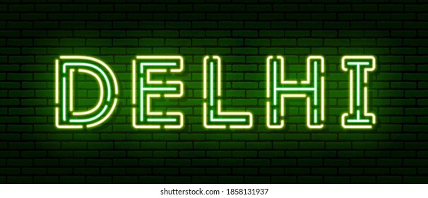 Glowing neon sign with the inscription of the Indian city of Delhi. In green and yellow colors. Against a brick wall. All elements are isolated.