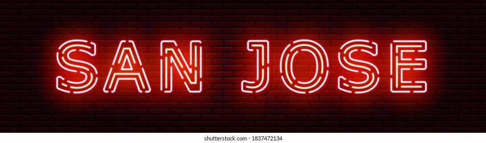 Glowing neon sign with the inscription of the USA city of San Jose. In red and orange colors. Against a brick wall. All elements are isolated.