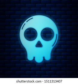 Glowing neon Skull icon isolated on brick wall background. Happy Halloween party.  Vector Illustration