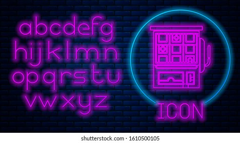 Glowing neon Slot machine icon isolated on brick wall background. Neon light alphabet. Vector Illustration