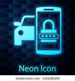 Glowing neon Smart car security system icon isolated on brick wall background. The smartphone controls the car security on the wireless. Vector Illustration