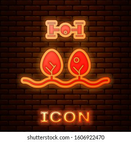 Glowing neon Smart farm with drone control and tree icon isolated on brick wall background. Innovation technology for agricultural company.  Vector Illustration