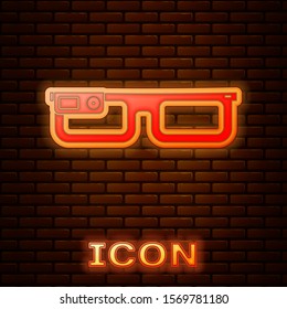 Glowing neon Smart glasses mounted on spectacles icon isolated on brick wall background. Wearable electronics smart glasses with camera and display.  Vector Illustration