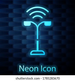 Glowing Neon Smart Street Light System Icon Isolated On Brick Wall Background. Internet Of Things Concept With Wireless Connection. Vector