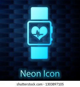Glowing neon Smart watch showing heart beat rate icon isolated on brick wall background. Fitness App concept. Vector Illustration