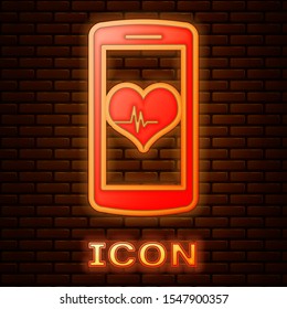 Glowing neon Smartphone with heart rate monitor function icon isolated on brick wall background.  Vector Illustration