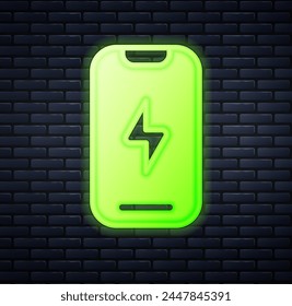 Glowing neon Smartphone, mobile phone icon isolated on brick wall background.  Vector