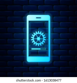 Glowing neon Smartphone update process with gearbox progress and loading bar icon isolated on brick wall background. System software update and upgrade concept. Vector Illustration