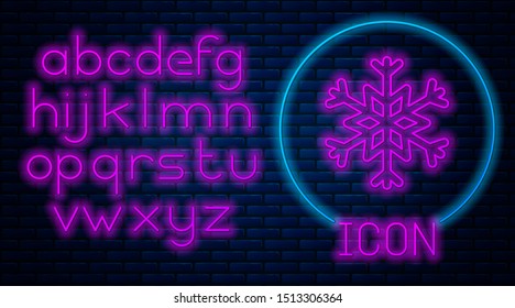 Glowing neon Snowflake icon isolated on brick wall background. Neon light alphabet. Vector Illustration