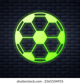 Glowing neon Soccer football ball icon isolated on brick wall background. Sport equipment.  Vector