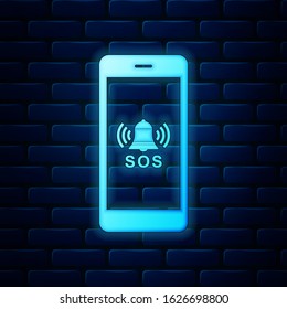 Glowing neon SOS call icon isolated on brick wall background. 911, emergency, help, warning, alarm.  Vector Illustration