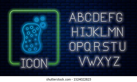 Glowing neon Sponge with bubbles icon isolated on brick wall background. Wisp of bast for washing dishes. Cleaning service logo. Neon light alphabet. Vector Illustration