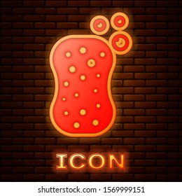 Glowing neon Sponge with bubbles icon isolated on brick wall background. Wisp of bast for washing dishes. Cleaning service logo.  Vector Illustration