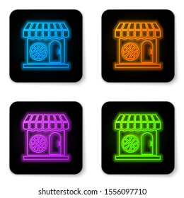 Glowing neon Sports shop and basketball ball icon isolated on white background. Sport store. Black square button. Vector Illustration
