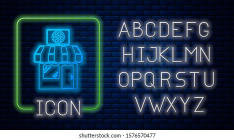 Glowing neon Sports shop and basketball ball icon isolated on brick wall background. Sport store. Neon light alphabet. Vector Illustration