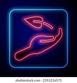Glowing neon Sprout in hand of environmental protection icon isolated on black background. Seed and seedling. Planting sapling. Ecology concept.  Vector