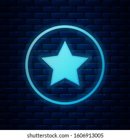 Glowing neon Star icon isolated on brick wall background. Favorite, best rating, award symbol.  Vector Illustration
